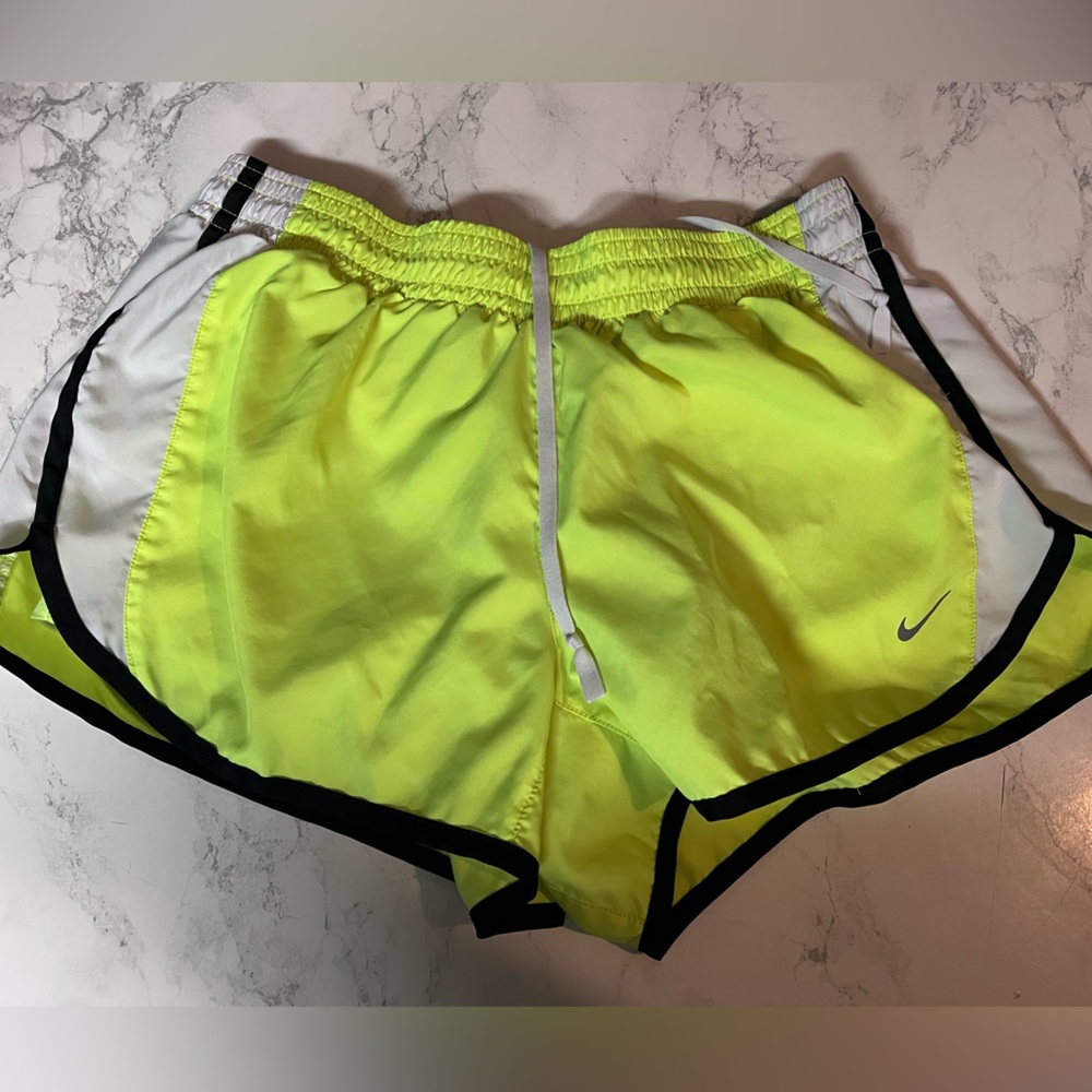 Super cute neon Nike dry fit shorts. They also have the spandex underneath